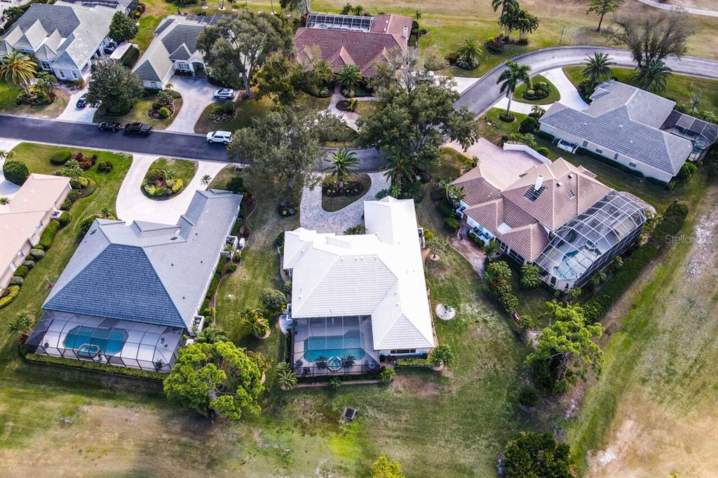 429 Tremingham Way Venice, FL 34293 - Photo 55 of 73 an aerial view of a house with a swimming pool outdoor seating and yard