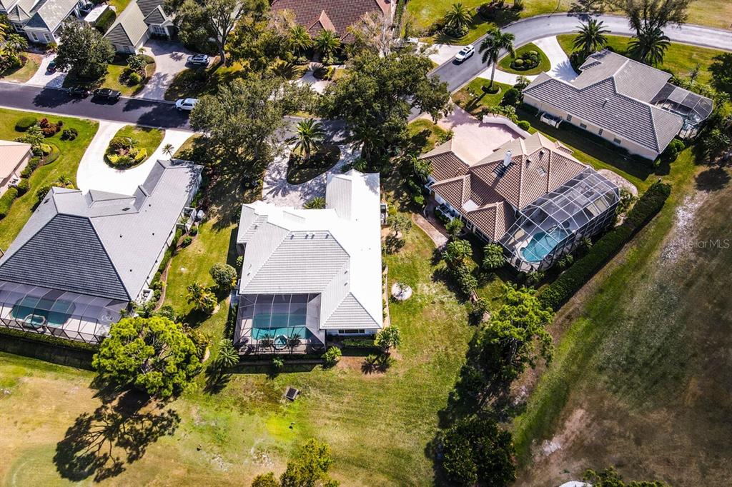 429 Tremingham Way Venice, FL 34293 - Photo 56 of 73 an aerial view of house with yard swimming pool and outdoor seating