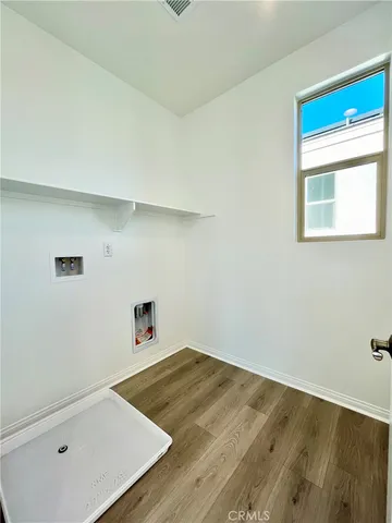 a room with a bed and a window