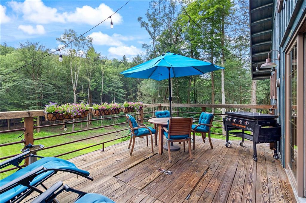 0 Wonder Lane Punxsutawney, PA 15767 - Photo 46 of 50 an outdoor sitting area with furniture and wooden deck