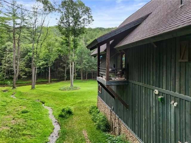 a view of a lush green space