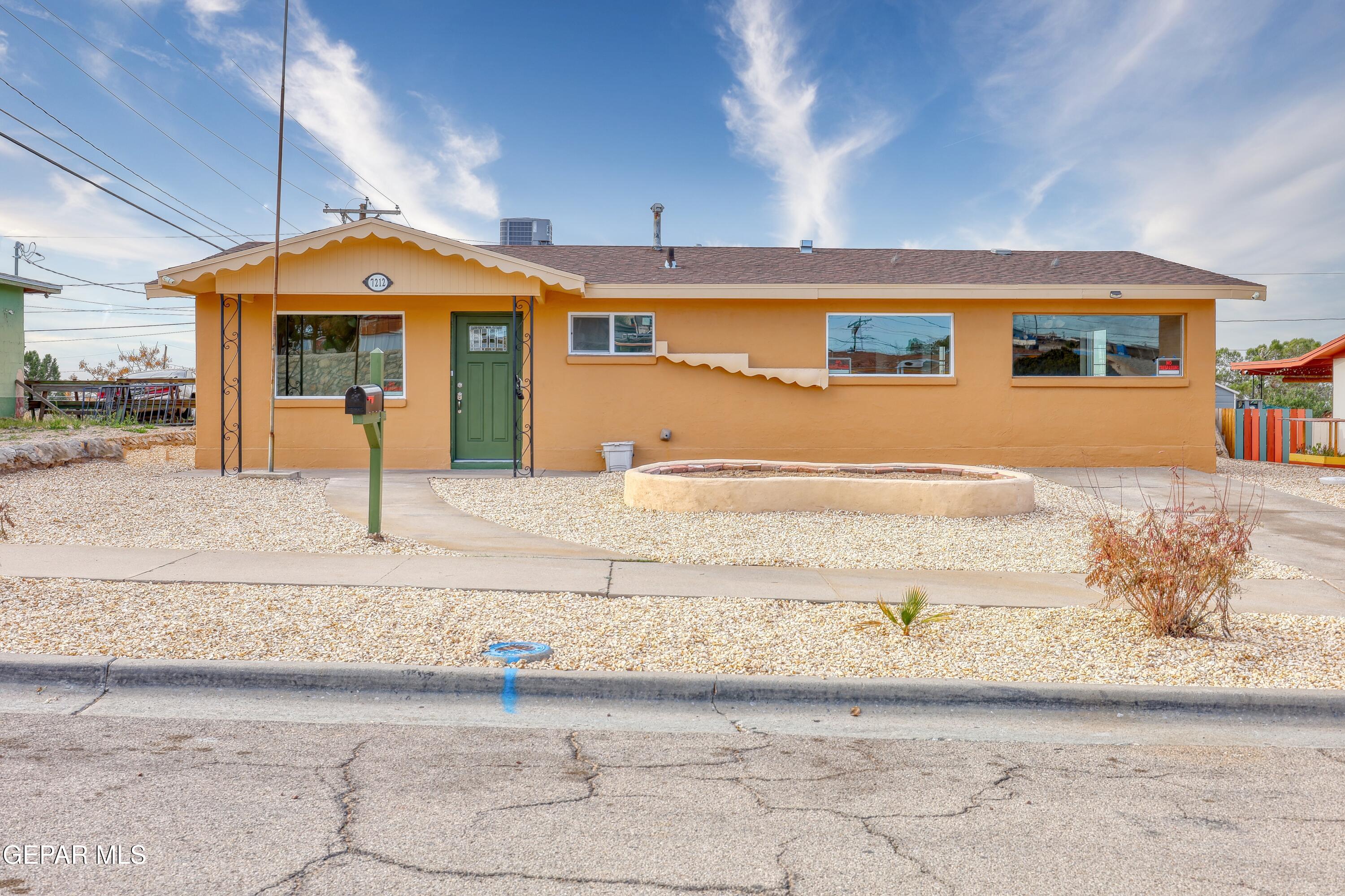 7212 Raton Drive El Paso, TX 79915 - Photo 1 of 44 a front view of a house with a patio