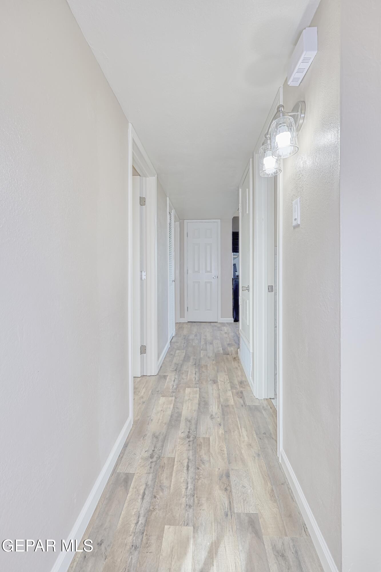 7212 Raton Drive El Paso, TX 79915 - Photo 14 of 44 a view of a room with wooden floor
