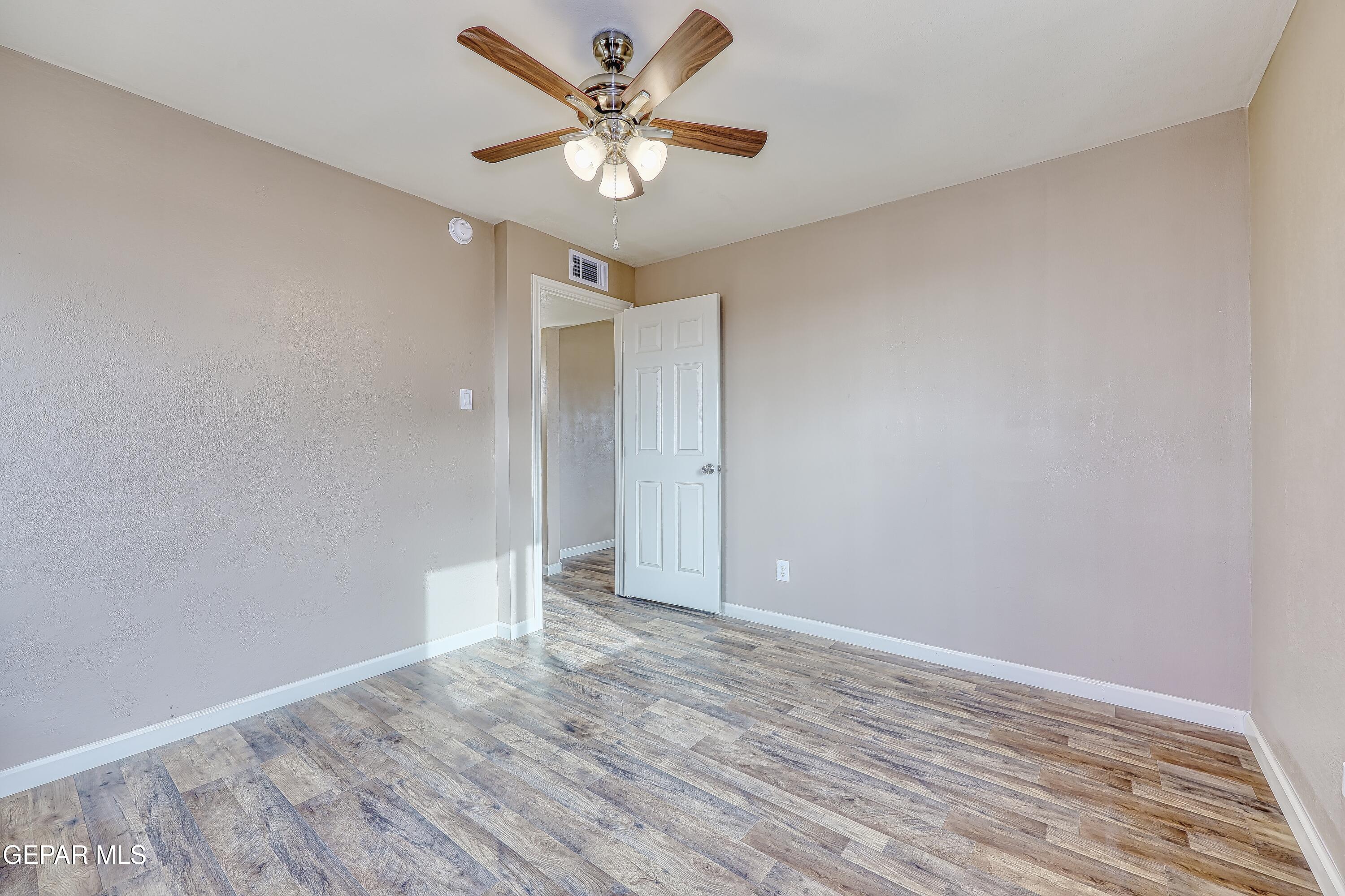 7212 Raton Drive El Paso, TX 79915 - Photo 16 of 44 wooden floor in an empty room