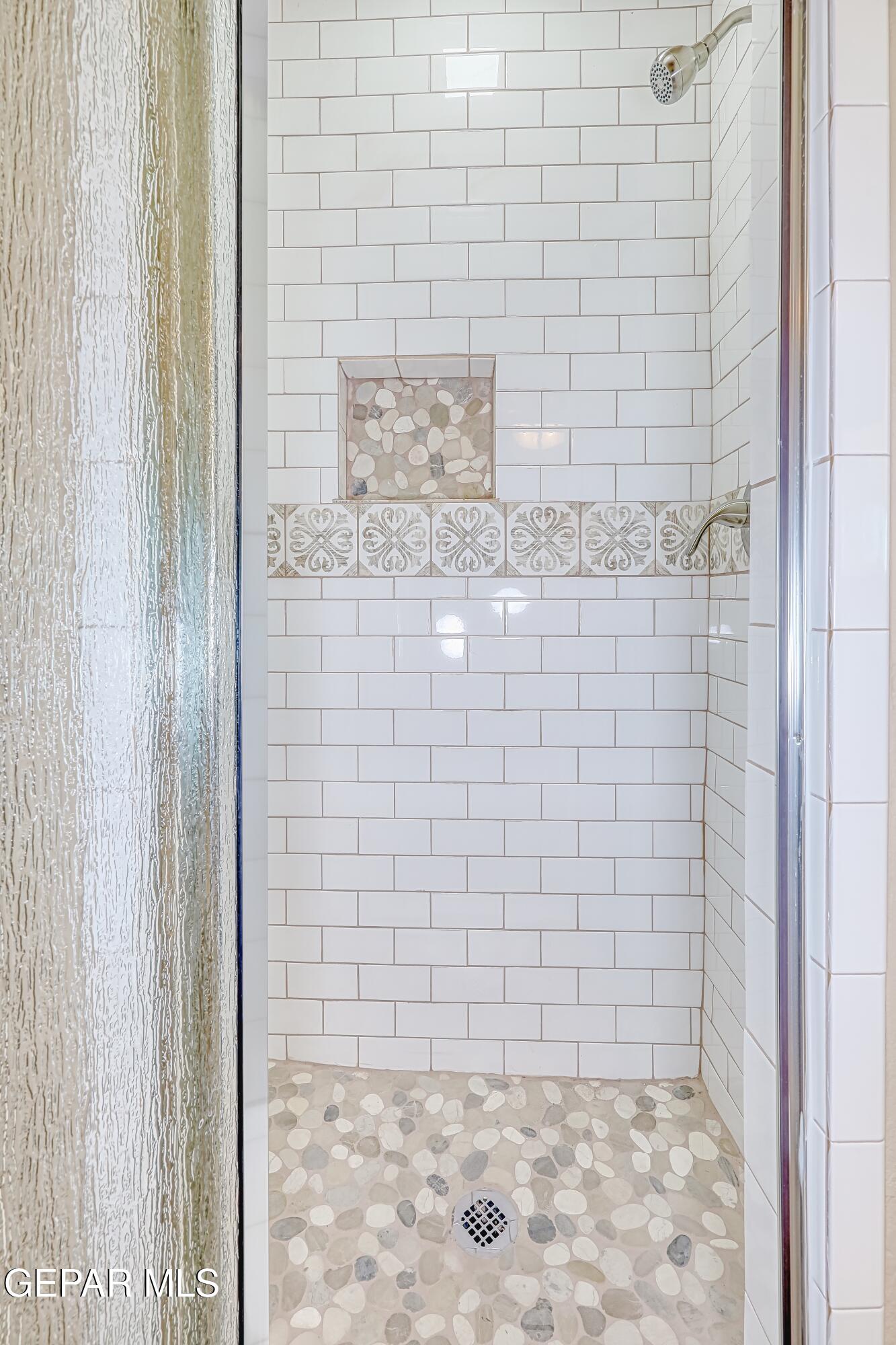 7212 Raton Drive El Paso, TX 79915 - Photo 25 of 44 a bathroom with a shower