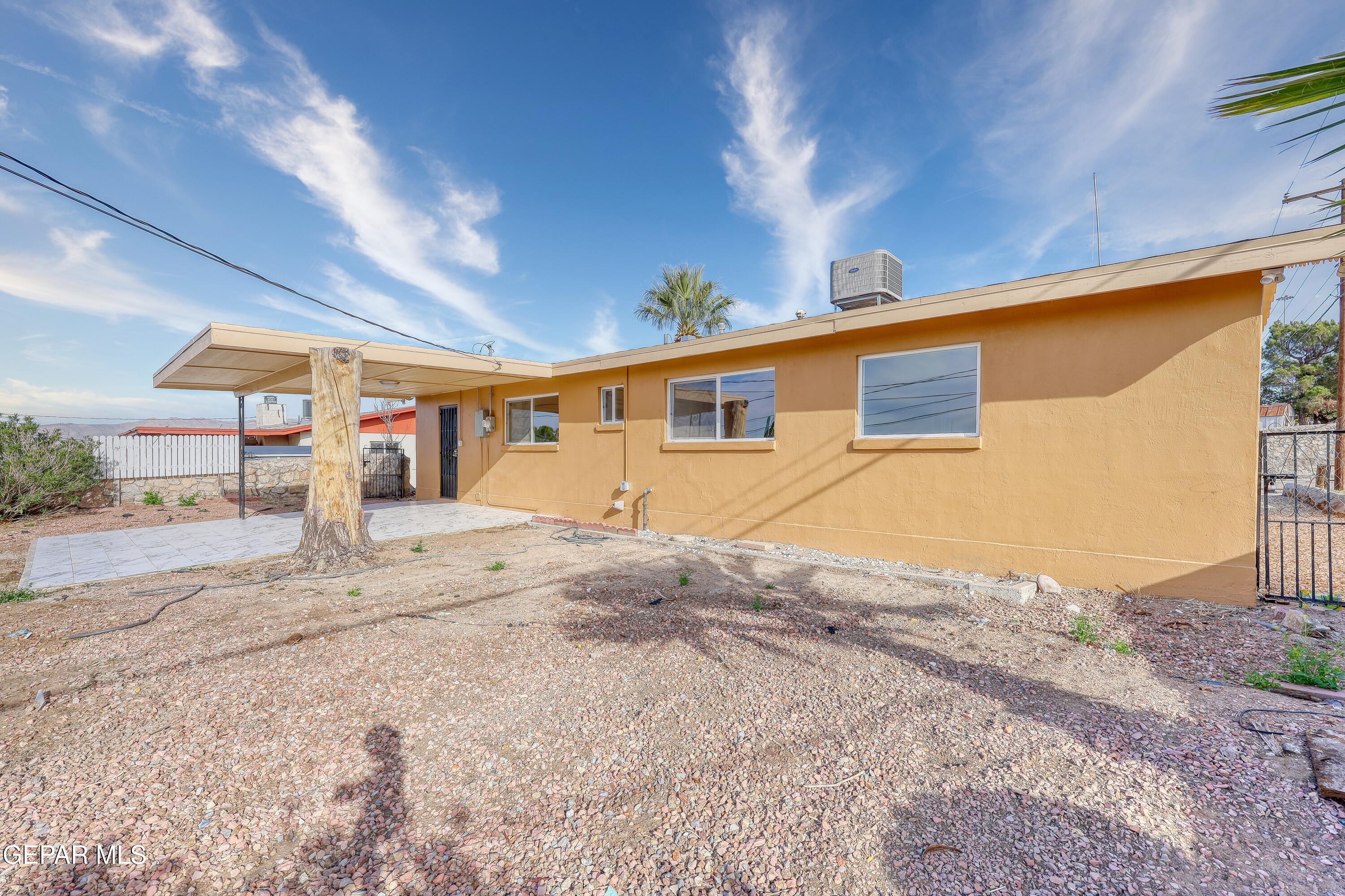 7212 Raton Drive El Paso, TX 79915 - Photo 36 of 44 a front view of a house with a yard