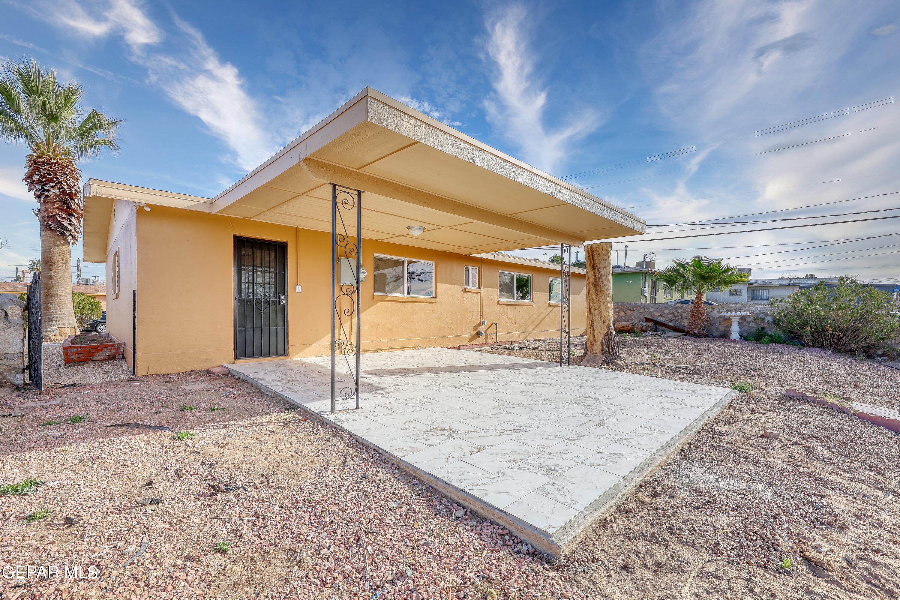 7212 Raton Drive El Paso, TX 79915 - Photo 37 of 44 a view of a house with a backyard