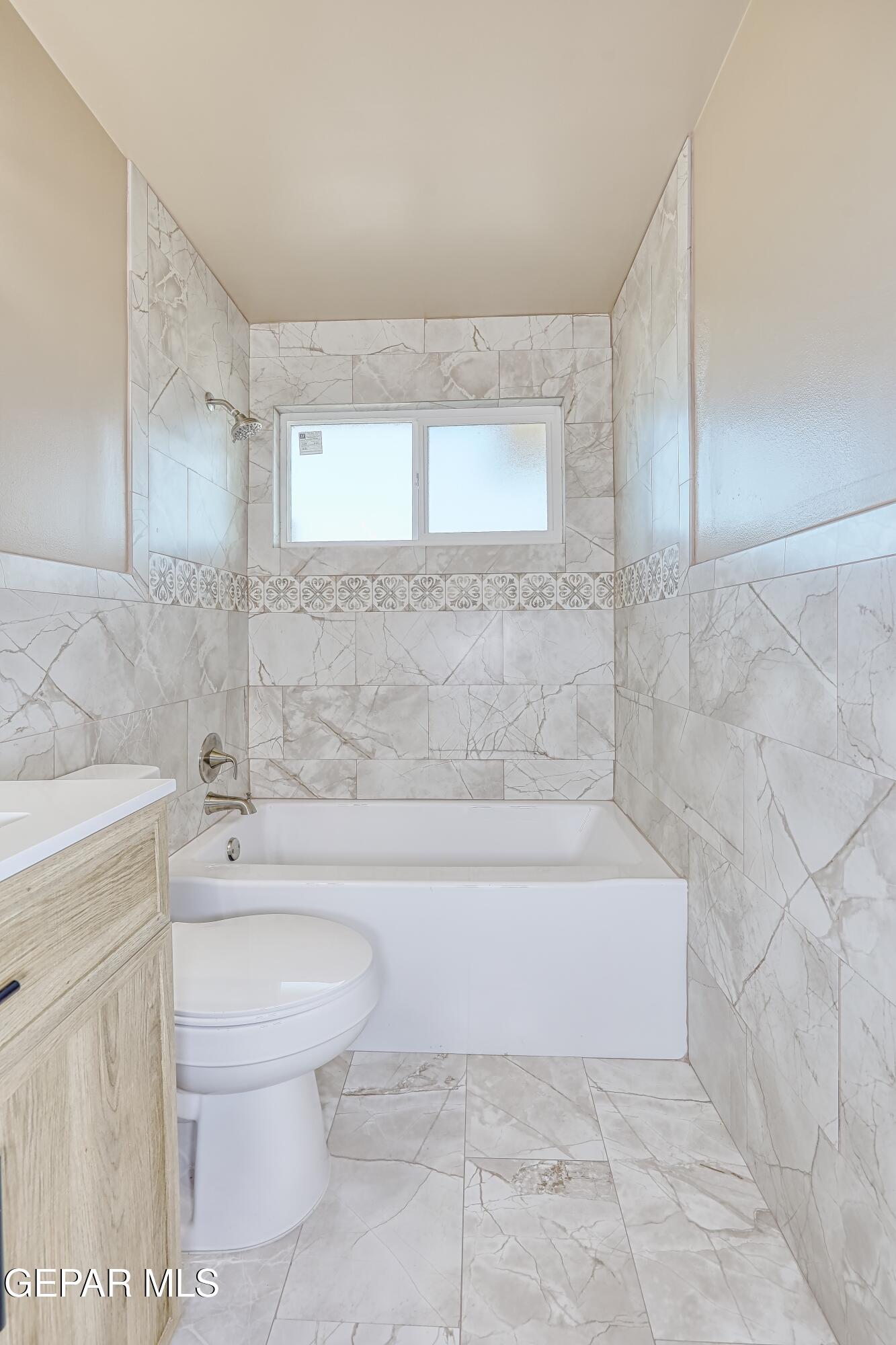 7212 Raton Drive El Paso, TX 79915 - Photo 4 of 44 a bathroom with a sink a toilet and bathtub