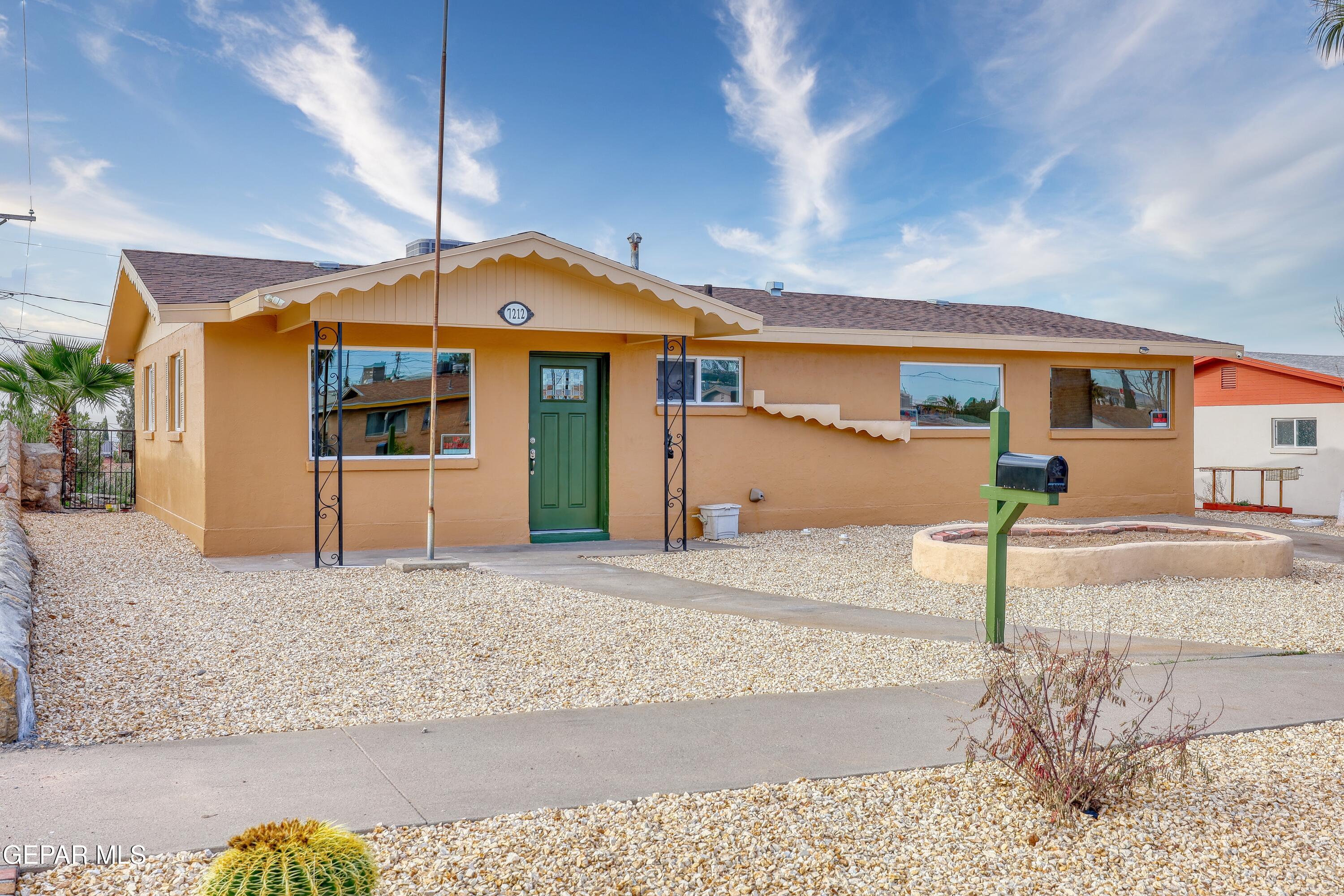 7212 Raton Drive El Paso, TX 79915 - Photo 6 of 44 a front view of a house with street
