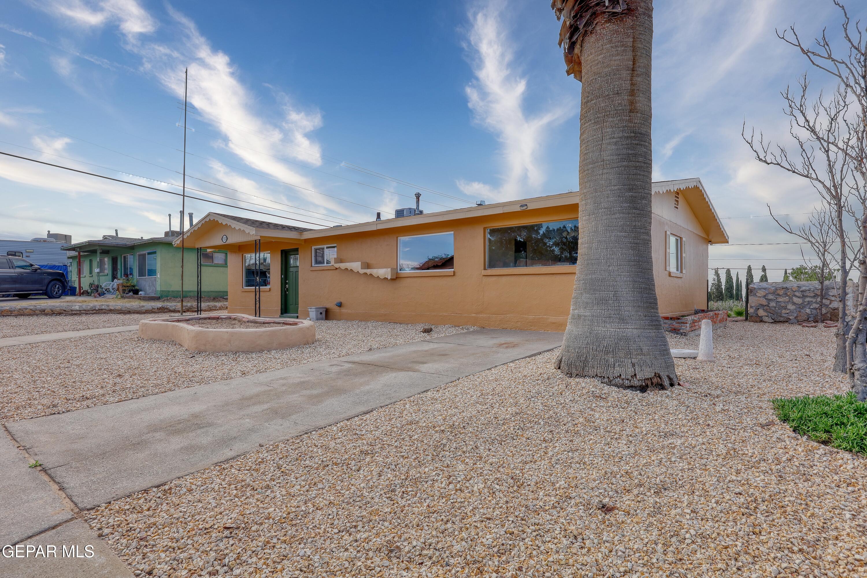 7212 Raton Drive El Paso, TX 79915 - Photo 8 of 44 a backyard of a house with shaded area