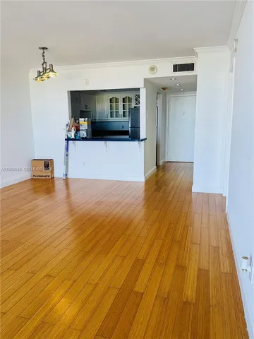 a view of kitchen and living room