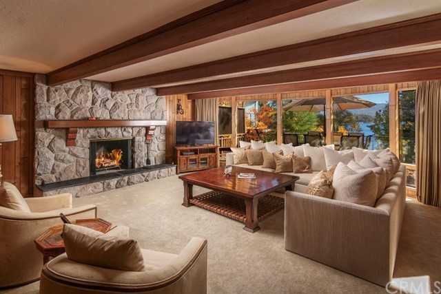 700 Oak Point Lake Arrowhead, CA 92352 - Photo 3 of 20 a living room with furniture and a fireplace