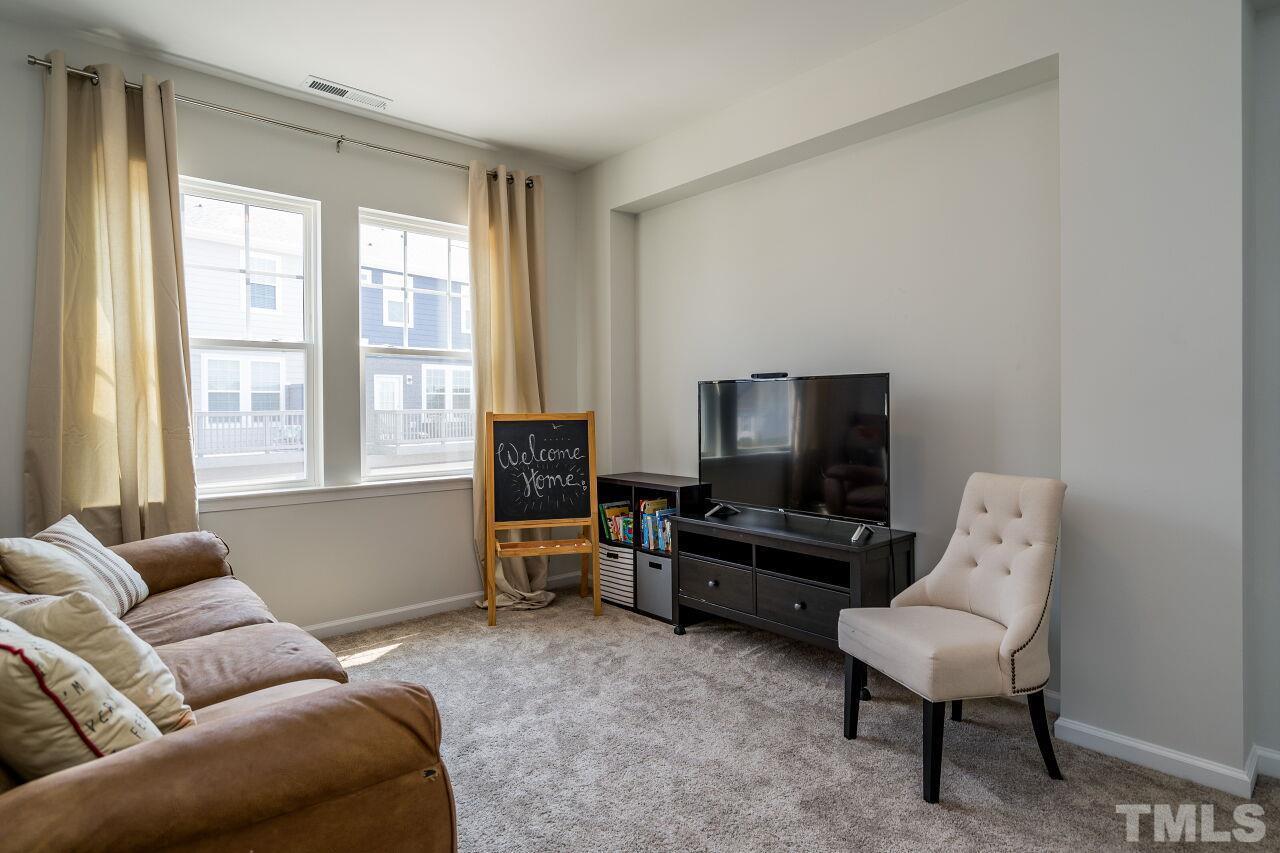 5220 Beckom Street Raleigh, NC 27616 - Photo 24 of 30 The loft offers another space for entertaining or relaxing.