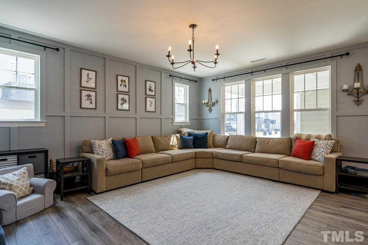 5220 Beckom Street Raleigh, NC 27616 - Photo 5 of 30 The inviting family room is quite spacious and gets lots of natural light.