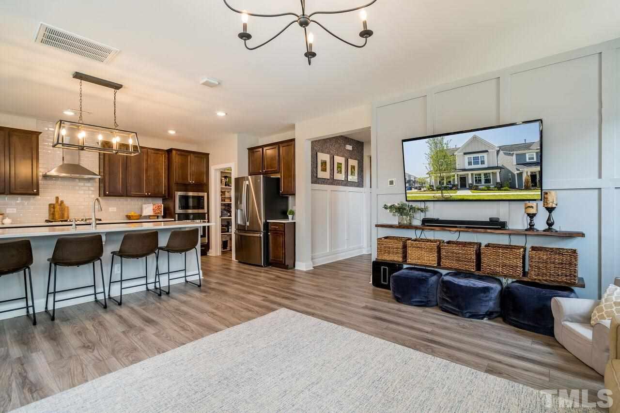 5220 Beckom Street Raleigh, NC 27616 - Photo 30 of 30 The open floor plan is ideal for entertaining and everyday living.