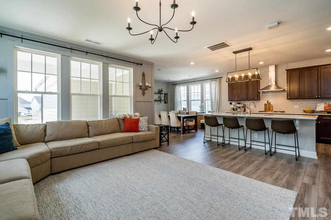 5220 Beckom Street Raleigh, NC 27616 - Photo 7 of 30 Natural light floods this lovely space.