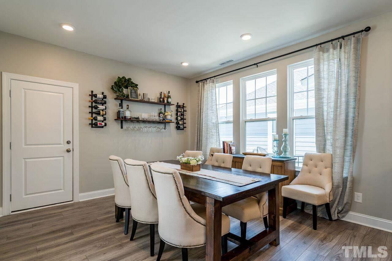 5220 Beckom Street Raleigh, NC 27616 - Photo 8 of 30 The impressive dining area will be memorable when hosting holiday gatherings or family celebrations.