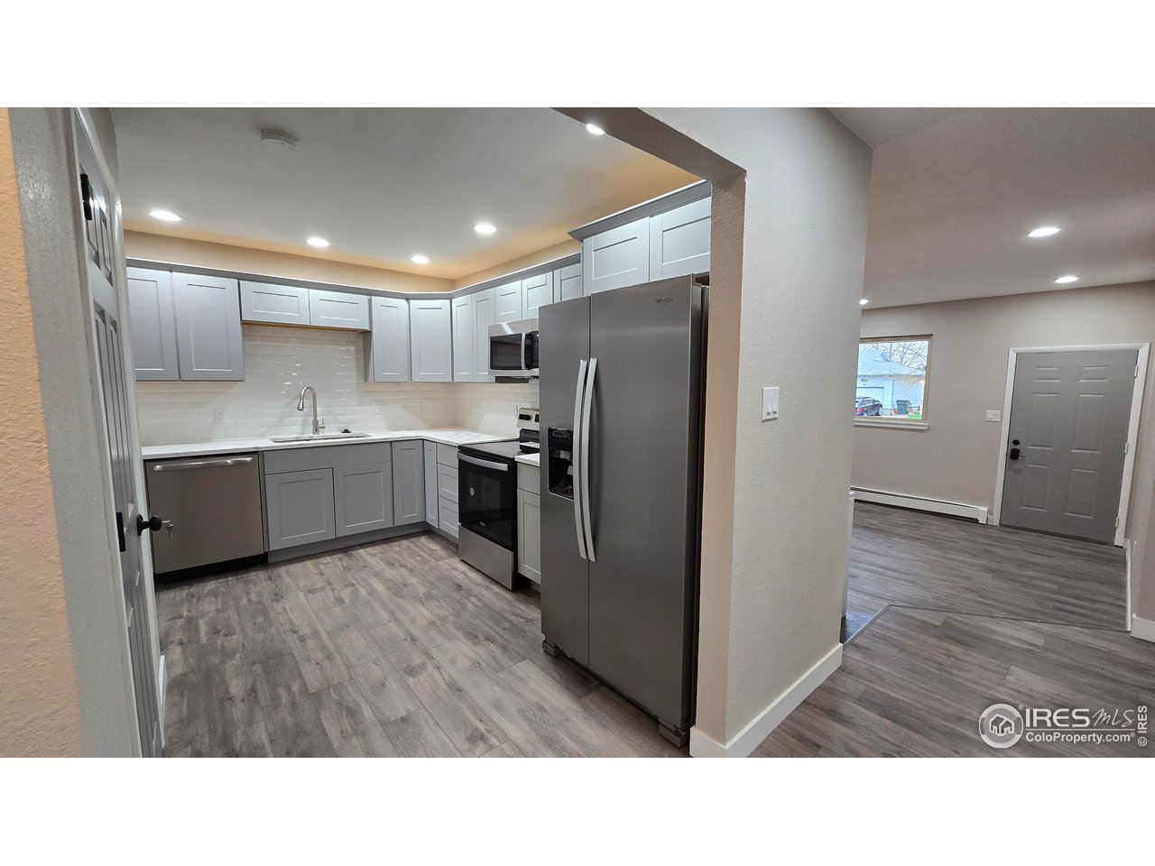 1312 Coolidge Street Sterling, CO 80751 - Photo 12 of 37 BEAUTIFUL UPDATED KITCHEN