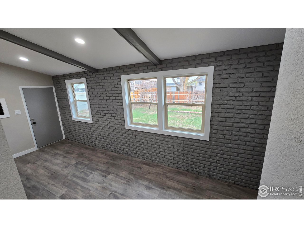 1312 Coolidge Street Sterling, CO 80751 - Photo 15 of 37 FROM THE KITCHEN LOOKING INTO THE FAMILY ROOM OVERLOOKING BACKYARD