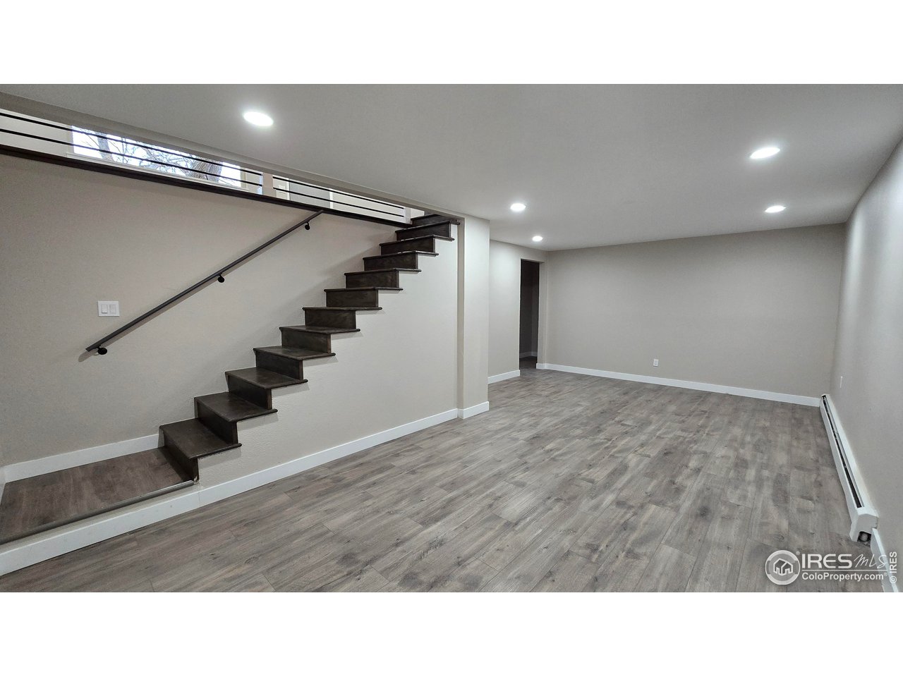 1312 Coolidge Street Sterling, CO 80751 - Photo 27 of 37 BASEMENT VIEW OF STAIRS TO LIVING ROOM
