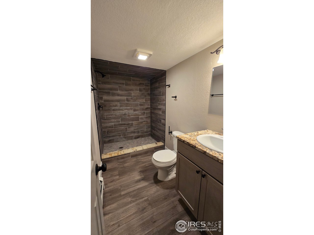 1312 Coolidge Street Sterling, CO 80751 - Photo 34 of 37 BASEMENT 3/4 BATHROOM