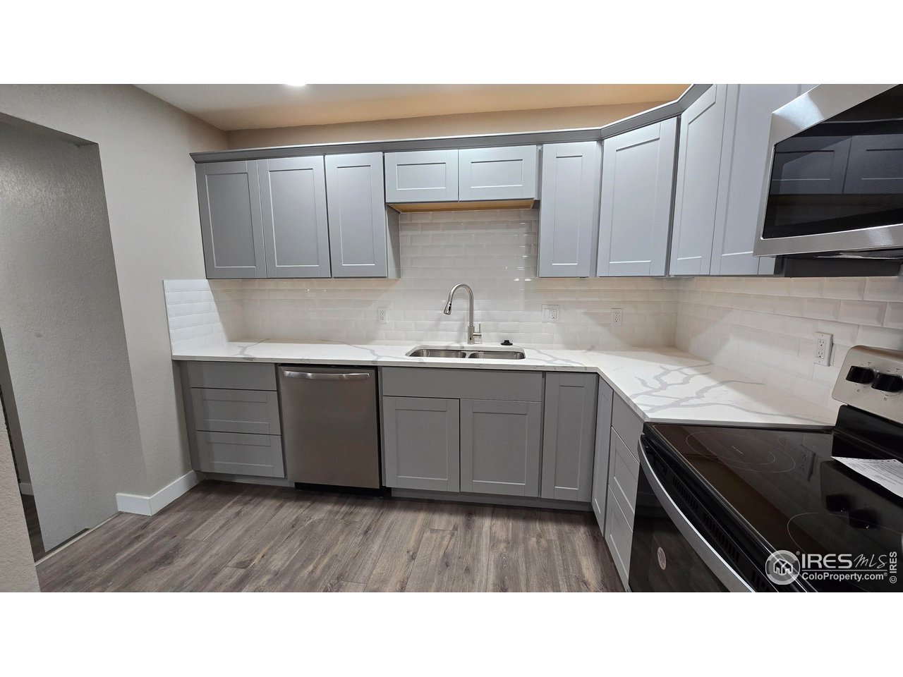 1312 Coolidge Street Sterling, CO 80751 - Photo 10 of 37 AMAZING COUNTERTOPS IN THE UPDATED KITCHEN
