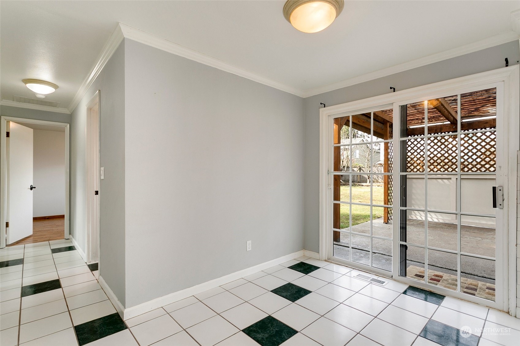 965 Hoquiam Avenue Northeast Renton, WA 98059 - Photo 14 of 37 a view of an entryway with wooden floor and cabinet