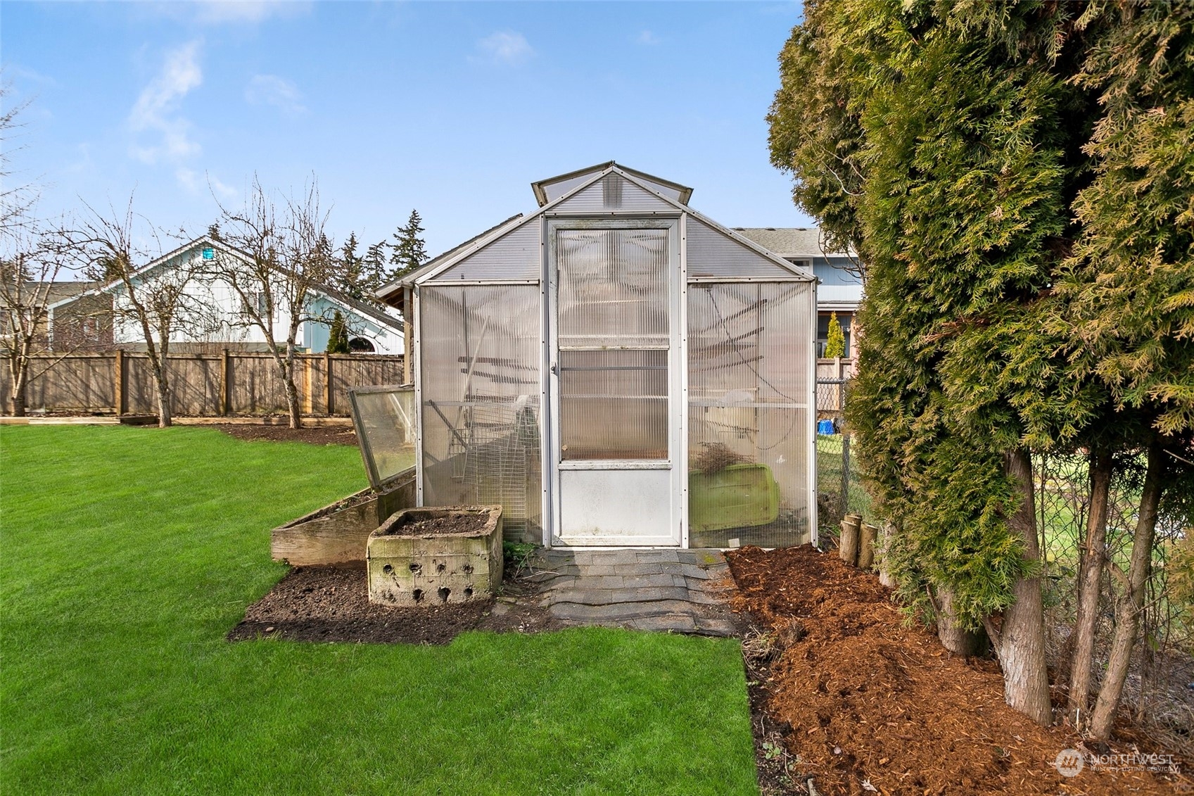 965 Hoquiam Avenue Northeast Renton, WA 98059 - Photo 30 of 37 a view of a back yard of the house