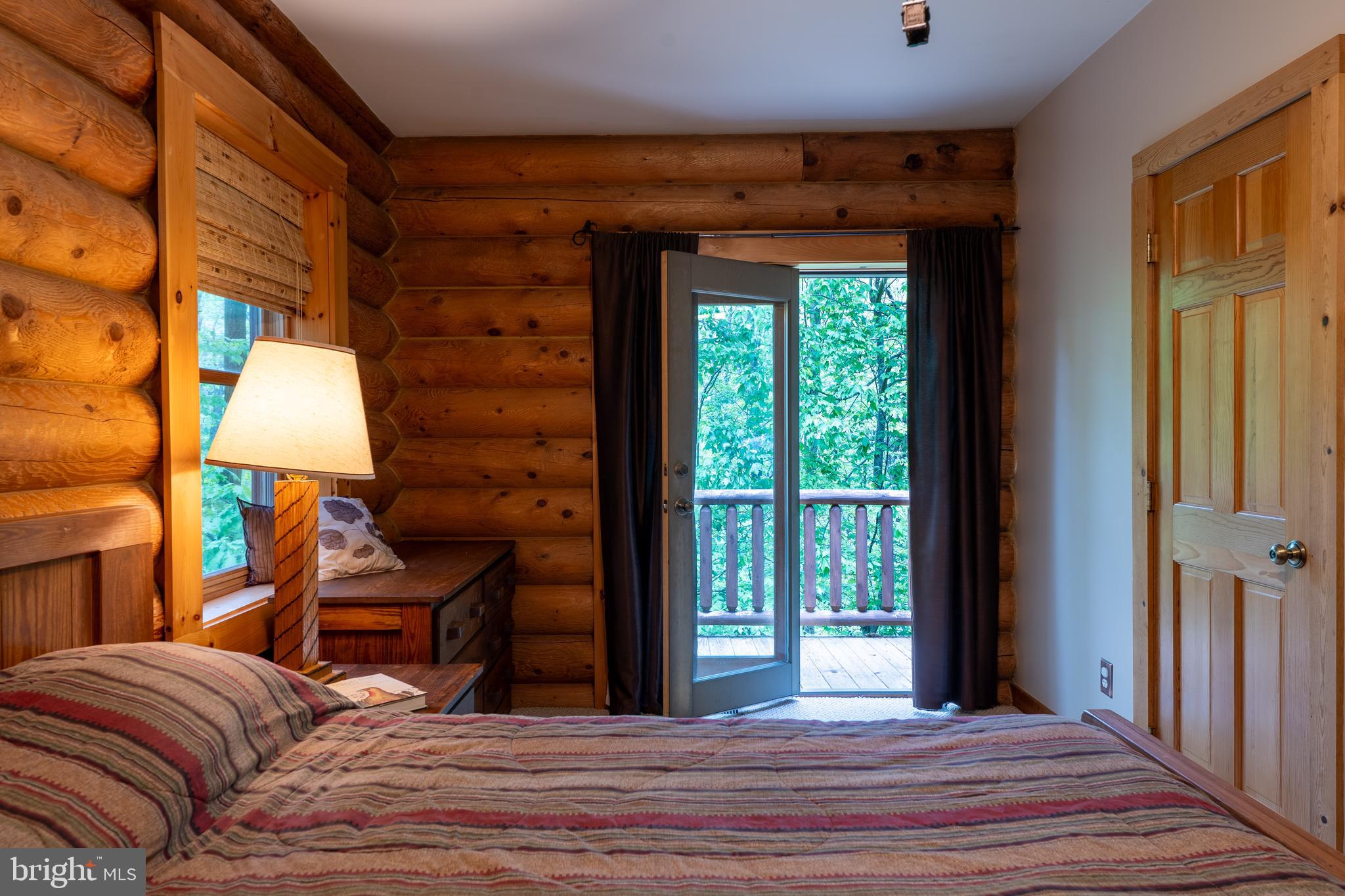 969 Hoyes Run Road McHenry, MD 21541 - Photo 27 of 56 Balcony off of primary bedroom