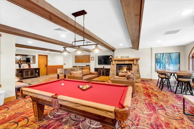 a living room with furniture and a table