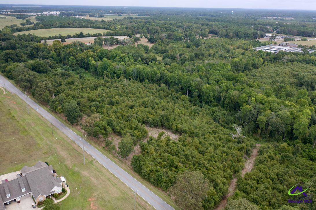 Airport Road Perry, GA 31069 - Photo 10 of 23 an aerial view of residential houses with outdoor space and trees