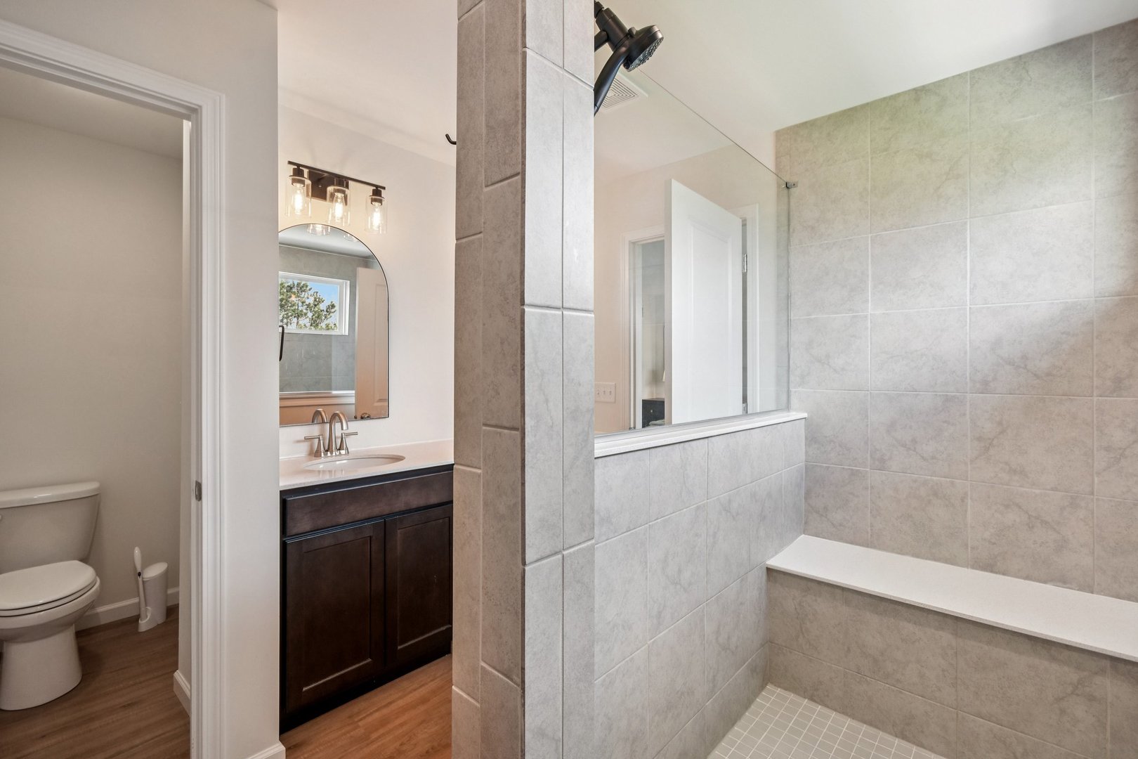 600 Alpine Drive Algonquin, IL 60102 - Photo 25 of 40 a bathroom with a toilet sink and mirror