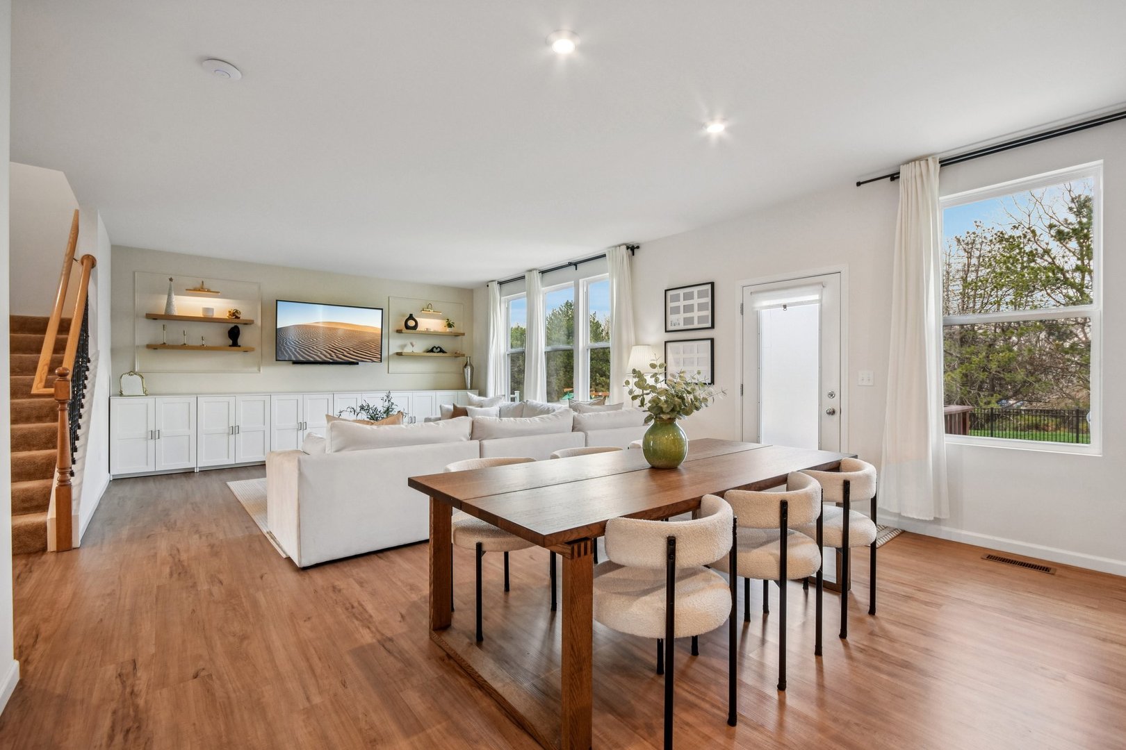 600 Alpine Drive Algonquin, IL 60102 - Photo 5 of 40 a view of a dining room with furniture window and wooden floor