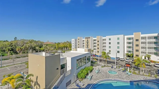 a kitchen with stainless steel appliances white cabinets and sink