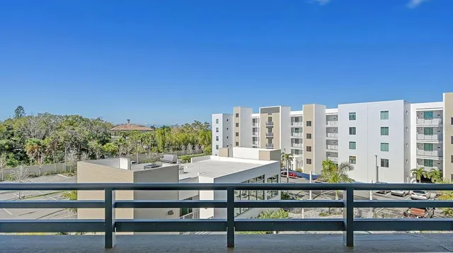 a swimming pool with outdoor seating and yard