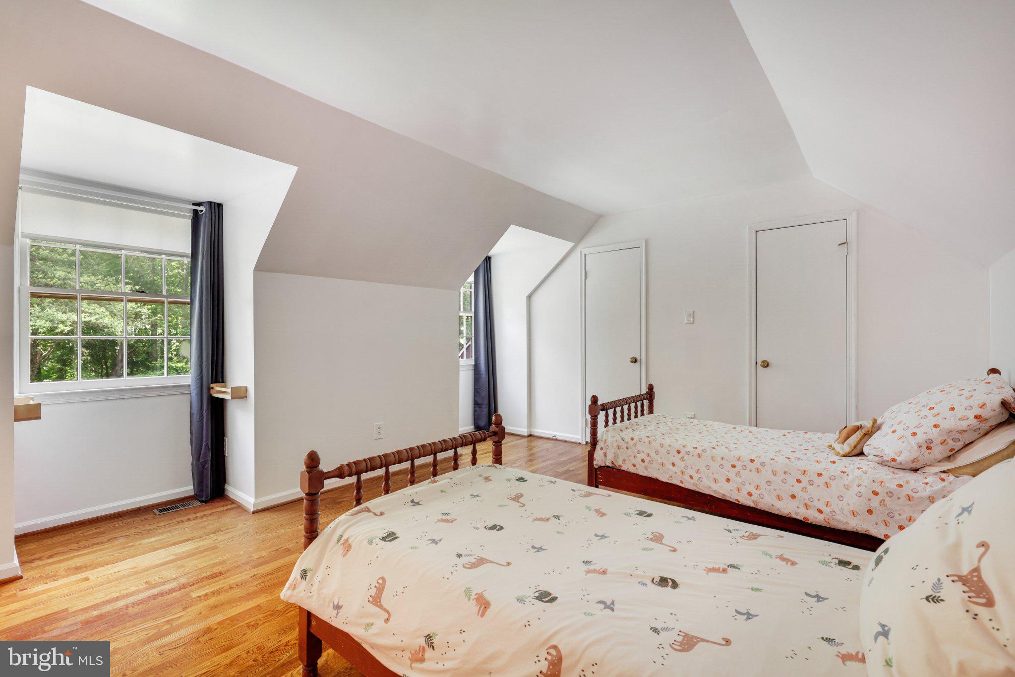 1427 Laurel Hill Road Vienna, VA 22182 - Photo 41 of 57 Charming attic bedroom with natural light.