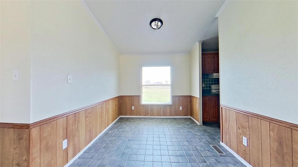 1106 Spring Flower Drive Krum, TX 76249 - Photo 13 of 22 a view of an empty room and window