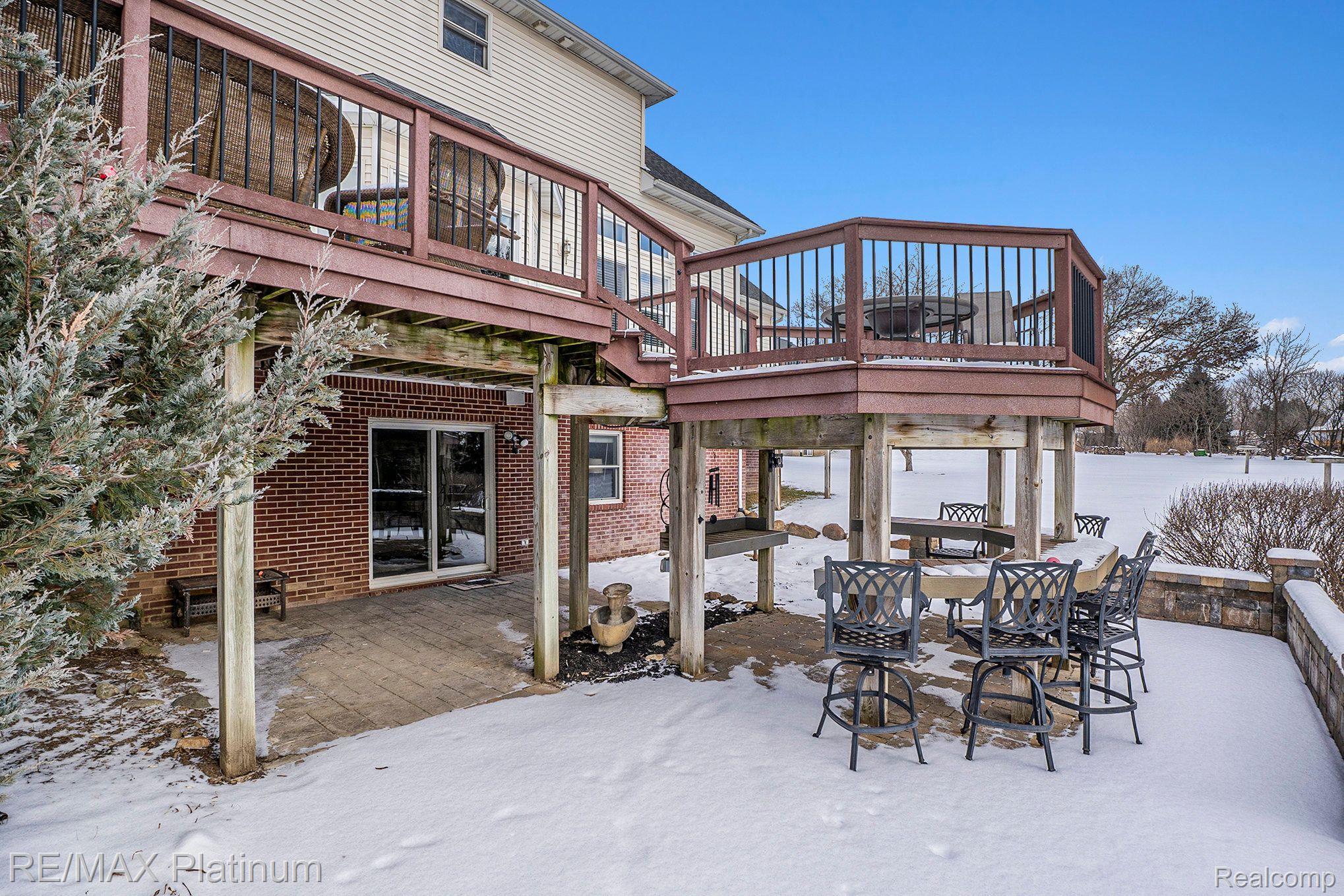 1112 Thorn Ridge Drive Howell, MI 48843 - Photo 23 of 30 Rear Patio and Deck