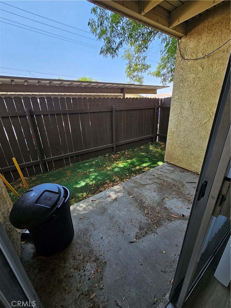 10976 Rincon Street Loma Linda, CA 92354 - Photo 12 of 12 a view of a backyard with plants and trees