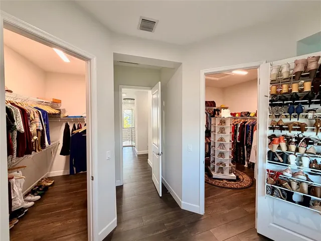 a kitchen with stainless steel appliances a refrigerator sink and microwave