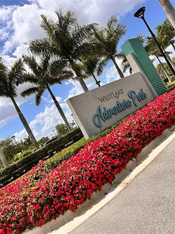 a view of a living room and entertaining space