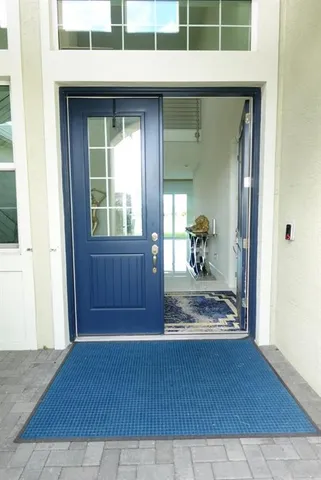 a view of a living room and a window