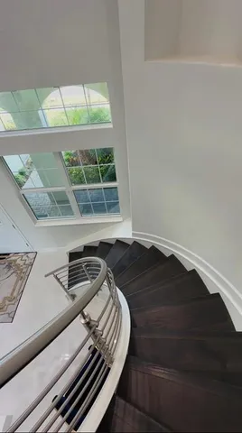 a bathroom with a sink and a window