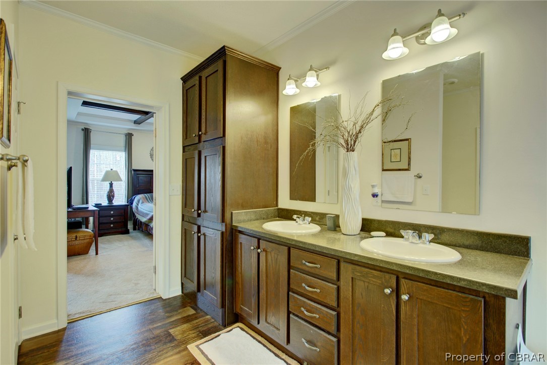1496 Elsom Mascot Road Mattaponi, VA 23110 - Photo 21 of 33 a spacious bathroom with a double vanity sink a mirror and shower