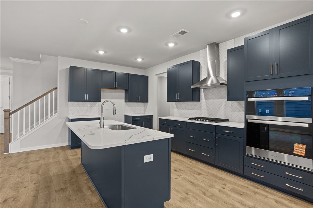 629 Sweetspire Trail, Unit 149 Seneca, SC 29678 - Photo 5 of 30 Culinary dreams come alive in this kitchen, boasting sleek cabinetry and premium appliances.