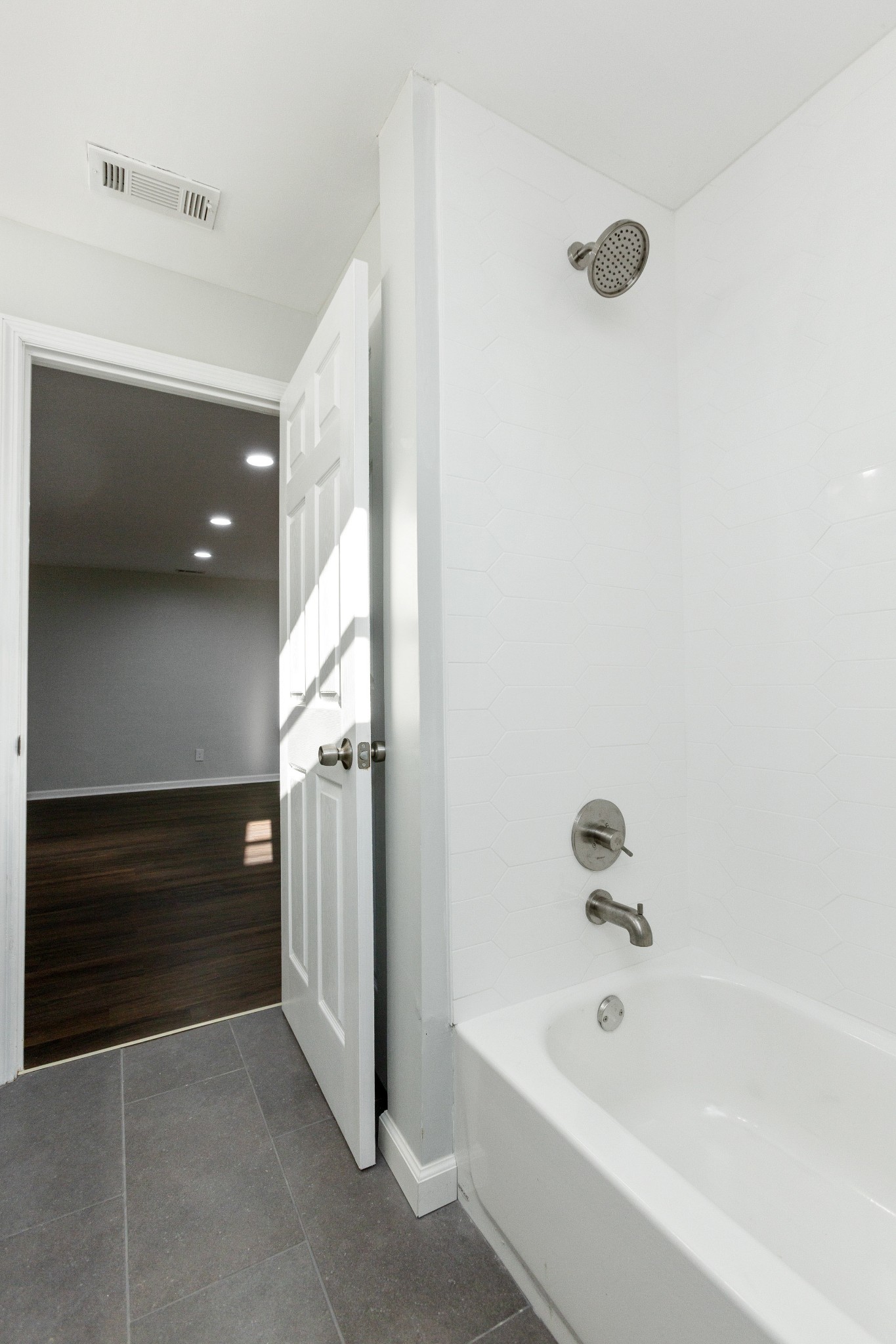 6169 Highway 76 Springfield, TN 37172 - Photo 17 of 34 a bathroom with a bathtub and a shower