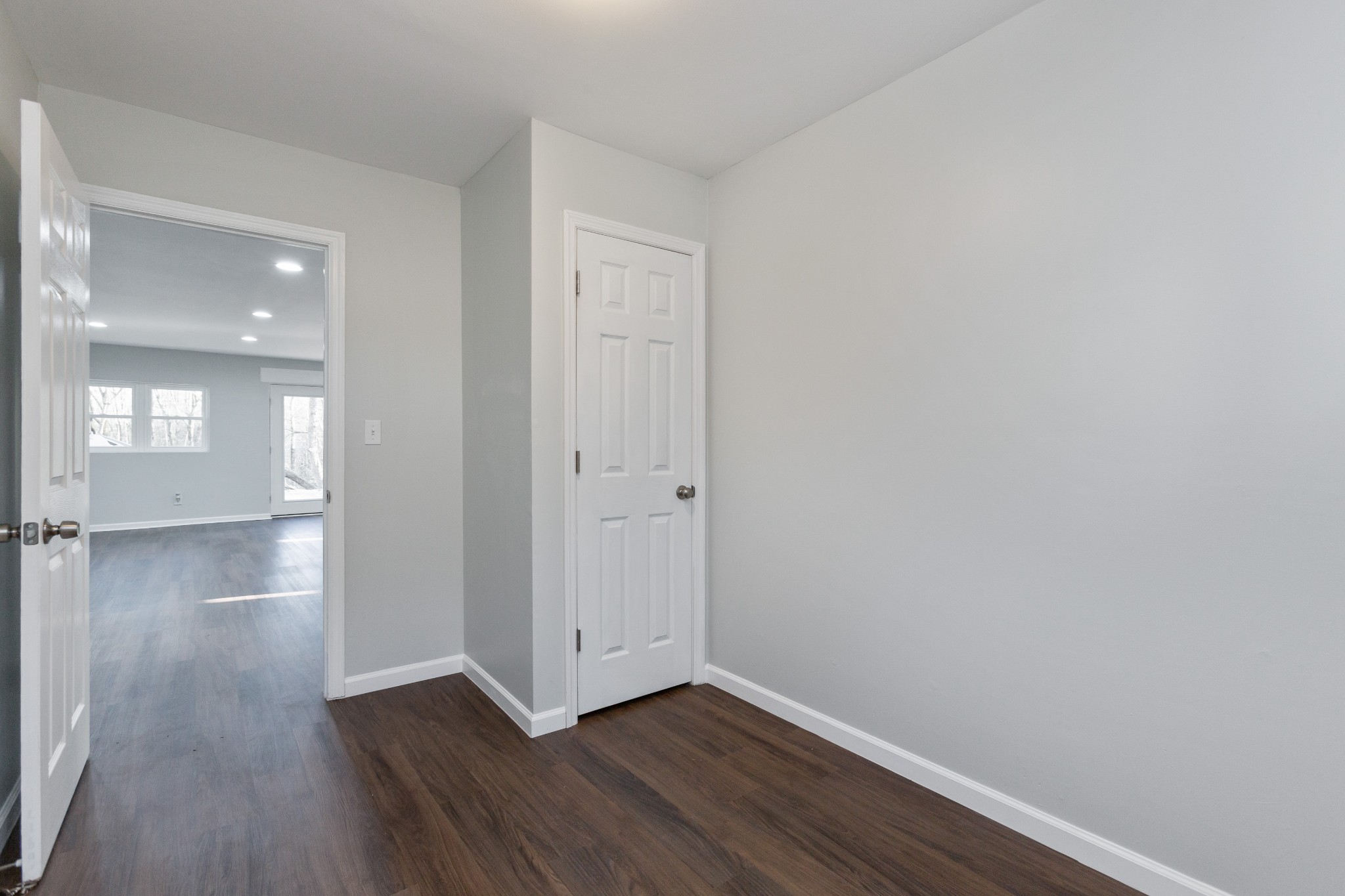 6169 Highway 76 Springfield, TN 37172 - Photo 22 of 34 a view of wooden floor and windows in a room