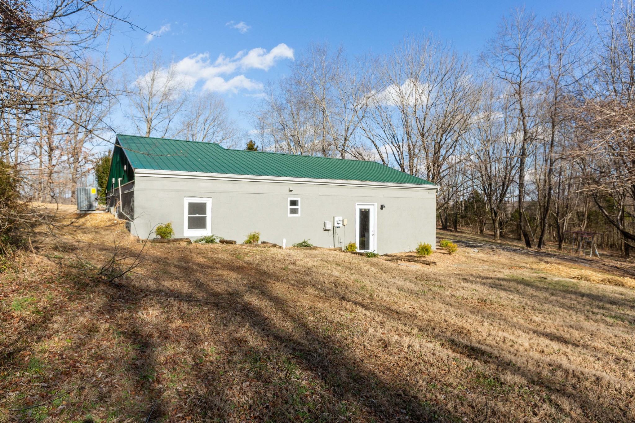 6169 Highway 76 Springfield, TN 37172 - Photo 33 of 34 a view of a house with a yard and garage