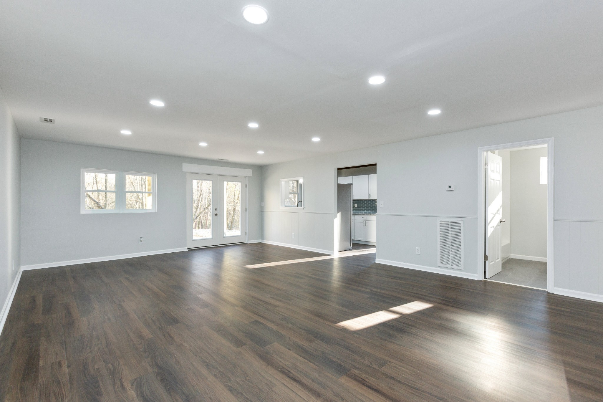 6169 Highway 76 Springfield, TN 37172 - Photo 7 of 34 a view of empty room with wooden floor and window
