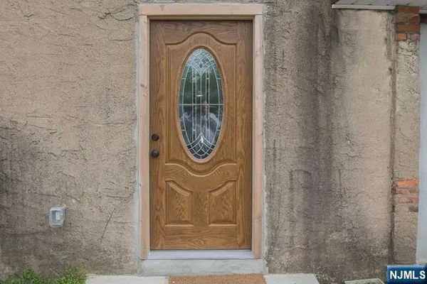 a view of a entryway with a door
